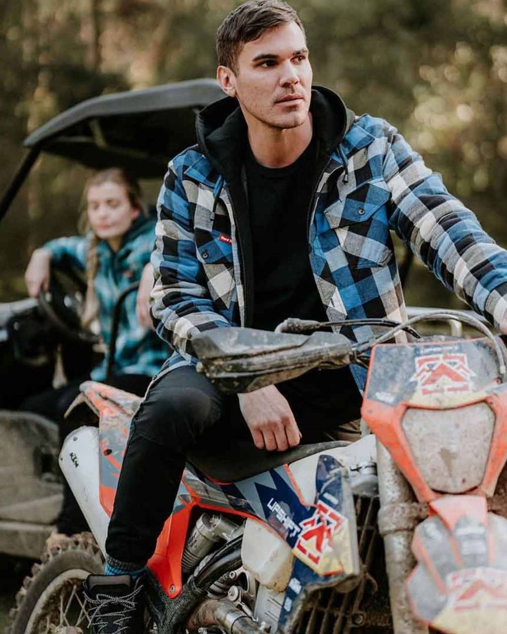 Blue Coloured Hard Yakka Mens Quilted Flannel Shacket on blurry Background 