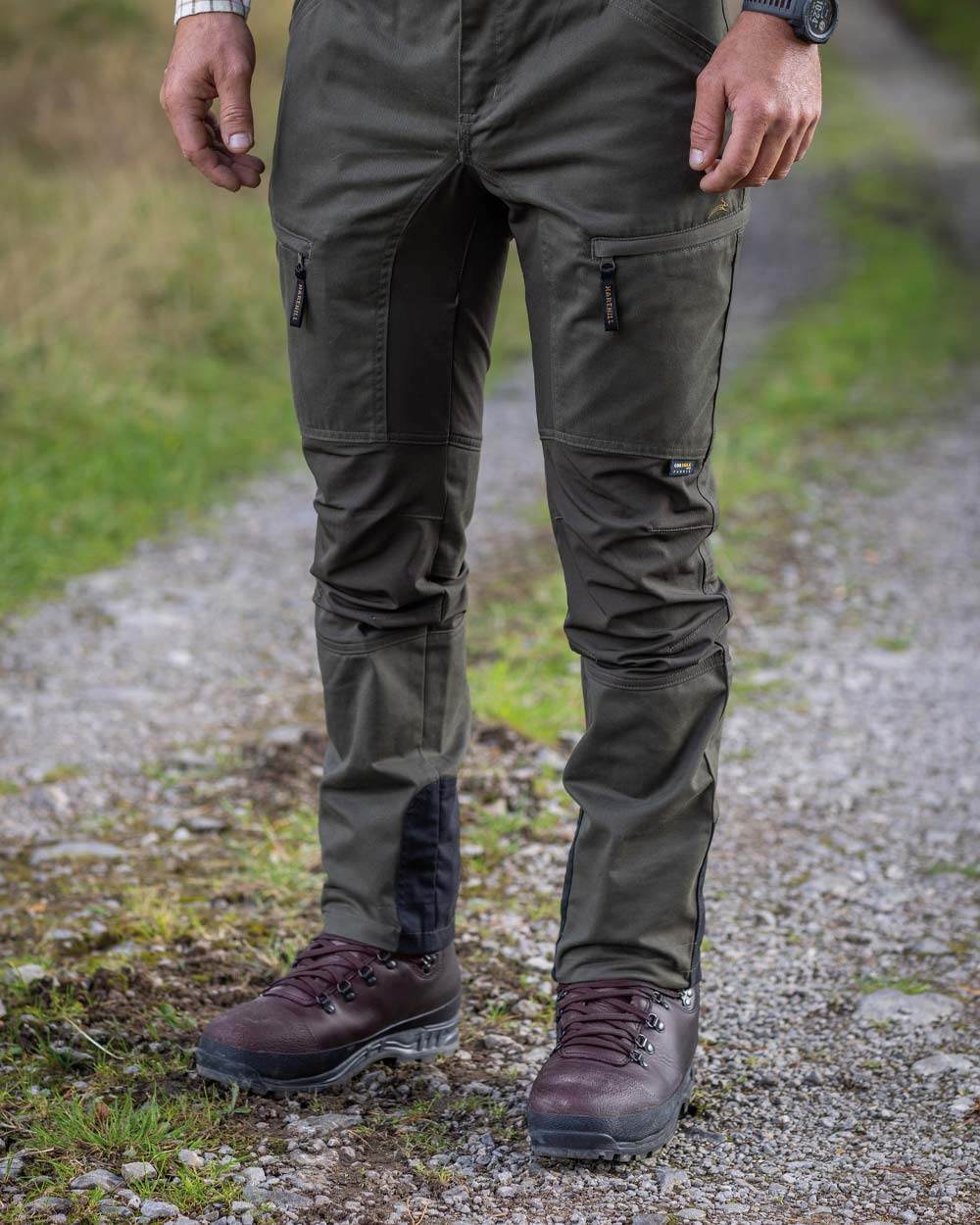 Forest Shade Coloured Harehill Ridgegate Shooting Trousers on outdoor background 