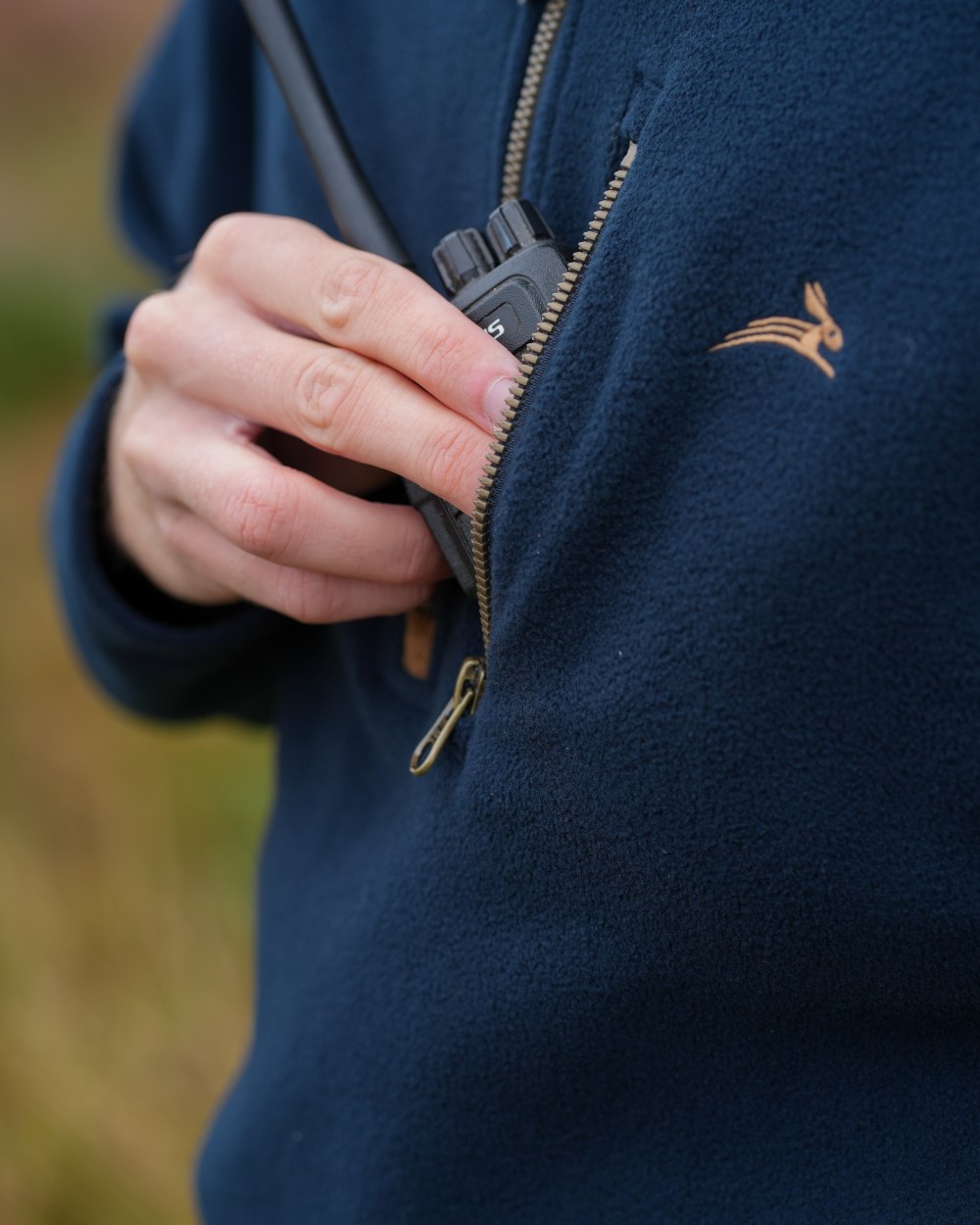 Navy coloured Harehill Varden Quarter Zip Fleece on a outdoor background 