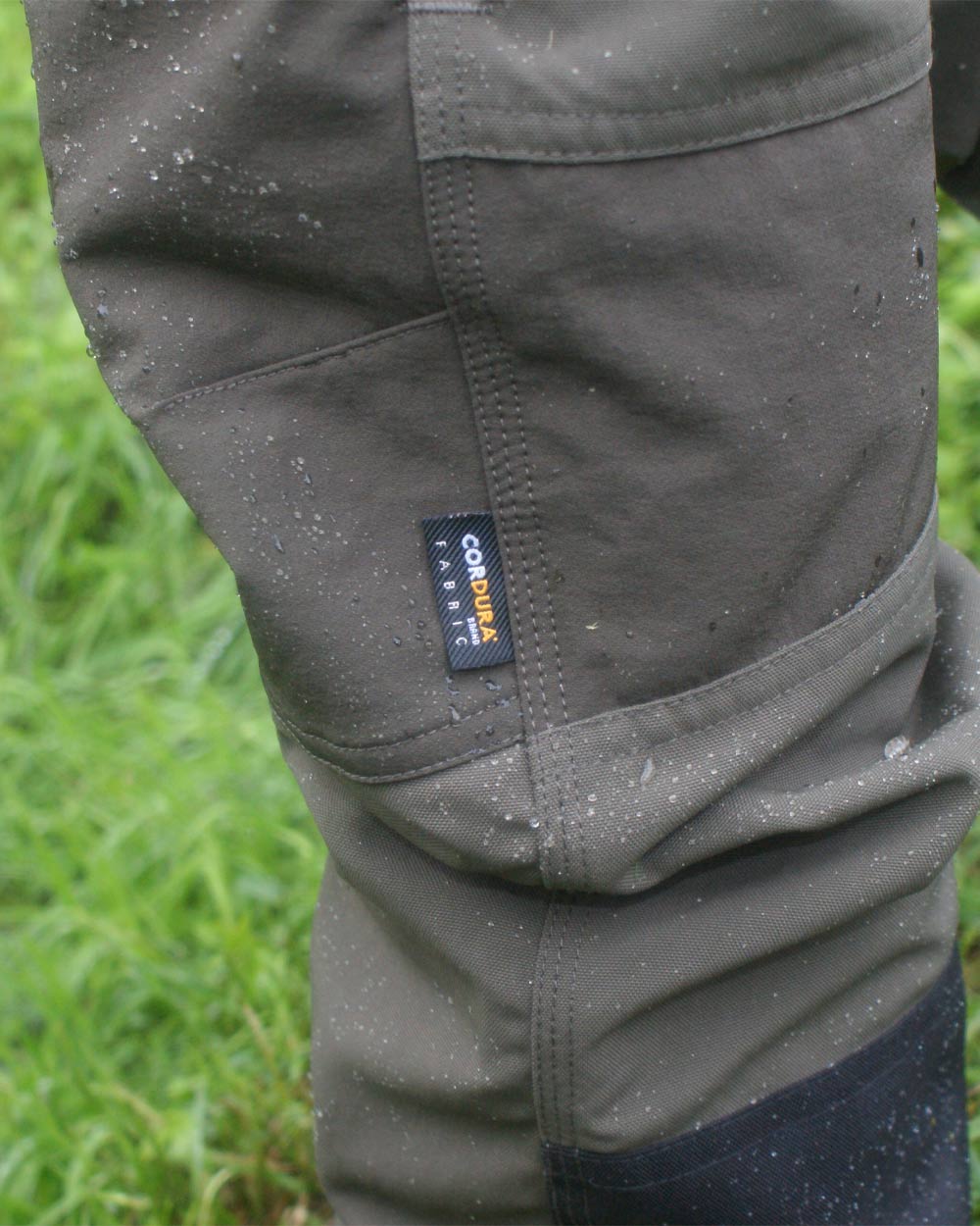 Forest Shade Coloured Harehill Waterproof Ridgegate Trousers on outdoor background 