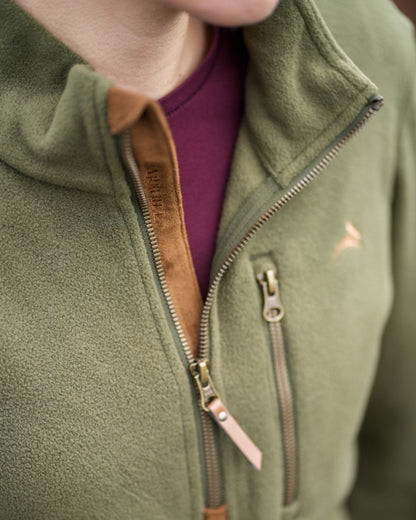 Olive coloured Harehill Womens Varden Fleece Quarter Zip Fleece on a moorland background 