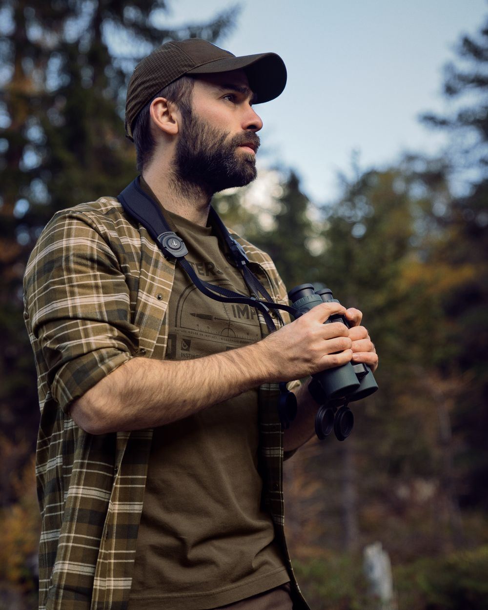 Antique Bronze Coloured Harkila Aivak Long Sleeved Shirt on outdoor background 
