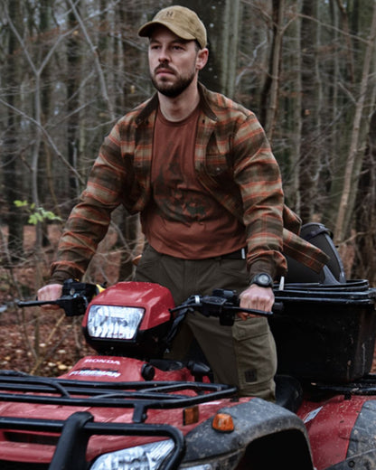 Autumn Orange Check coloured Harkila Aivak Long Sleeved Shirt on forest background 