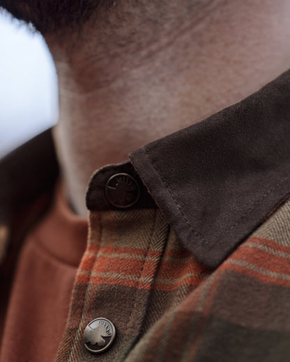 Autumn Orange Check coloured Harkila Aivak Long Sleeved Shirt on forest background 