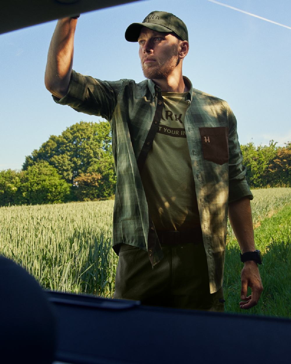 Duffel Green Coloured Harkila Akkan Shirt on outdoor background 