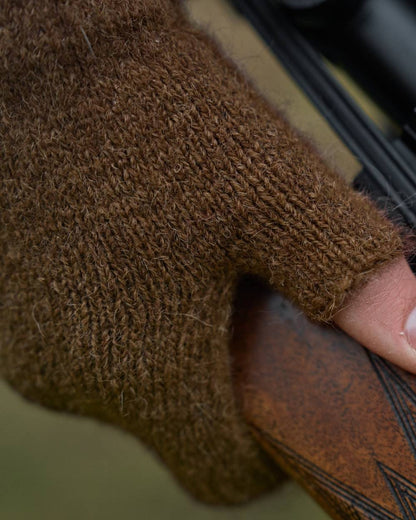 Pinecone Brown Coloured Harkila Alpacka Half Finger Gloves on outdoor background 