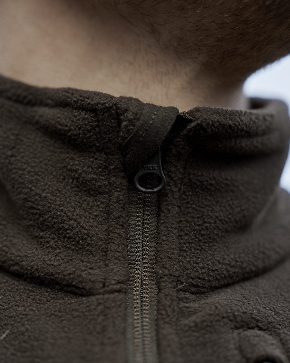Shadow Brown Coloured Harkila Aspire Fleece Waistcoat on outdoor background 