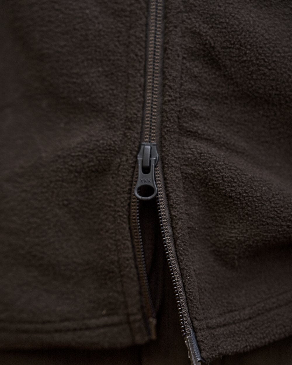 Shadow Brown Coloured Harkila Aspire Fleece Waistcoat on outdoor background 