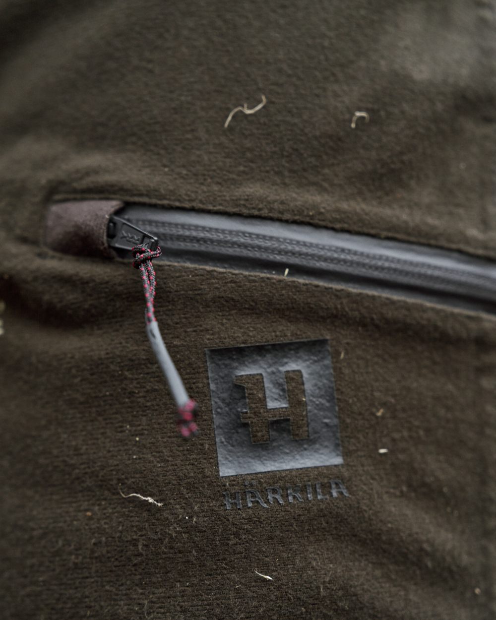 Hunting Green Shadow Brown Coloured Harkila Aspire HWS Trousers on forest background 