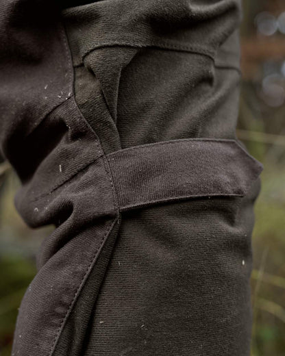 Hunting Green Shadow Brown Coloured Harkila Aspire HWS Trousers on forest background 