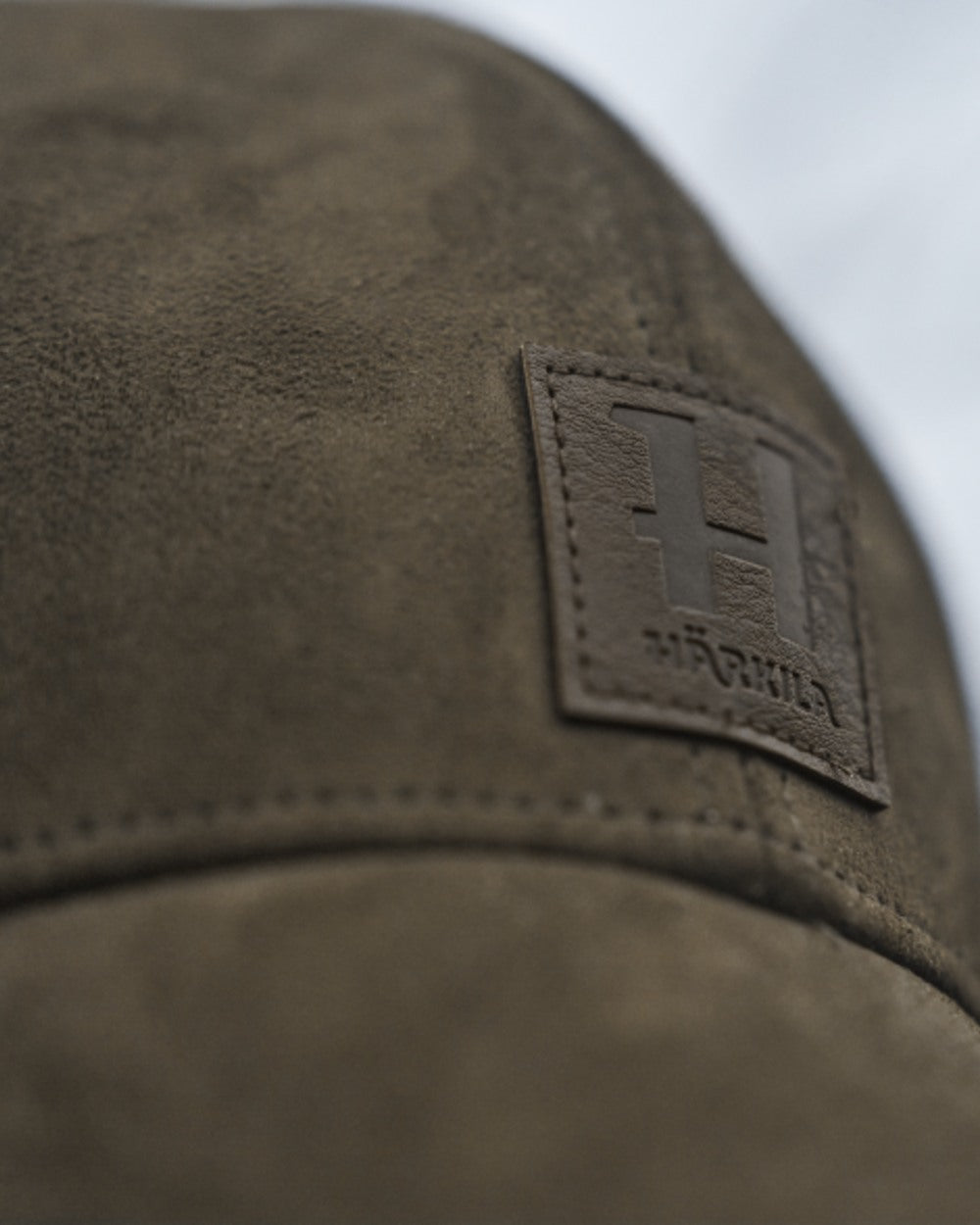 Hunting Green Coloured Harkila Berkshire Cap on outdoor background 