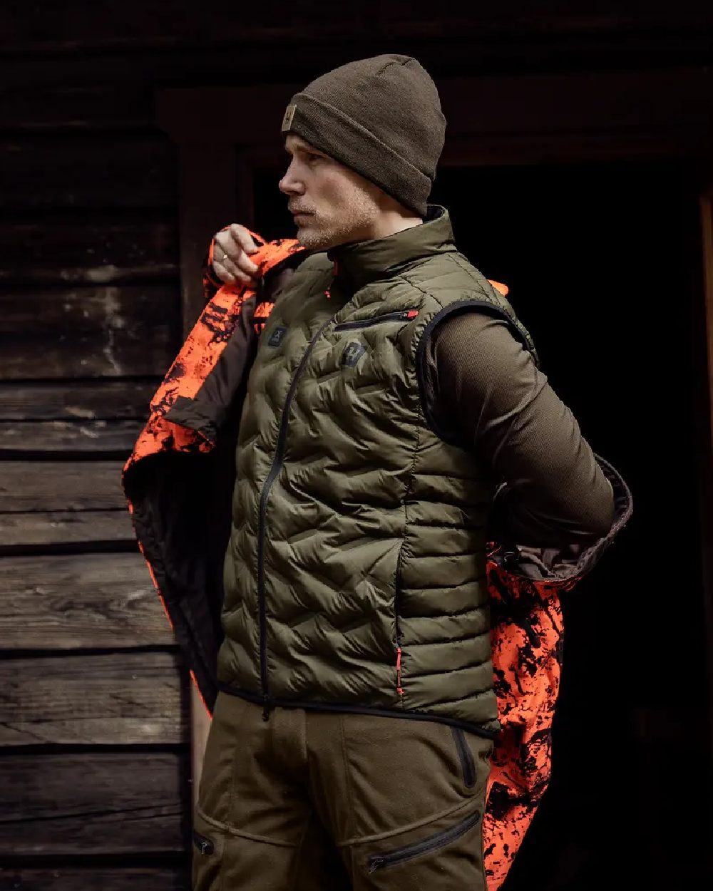 Willow Green Coloured Harkila Clim8 Insulated Waistcoat on outdoor background 