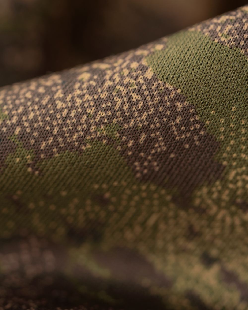 AXIS Forest Coloured Harkila Deer Stalker Camo Fleece Hoodie on blurry background 