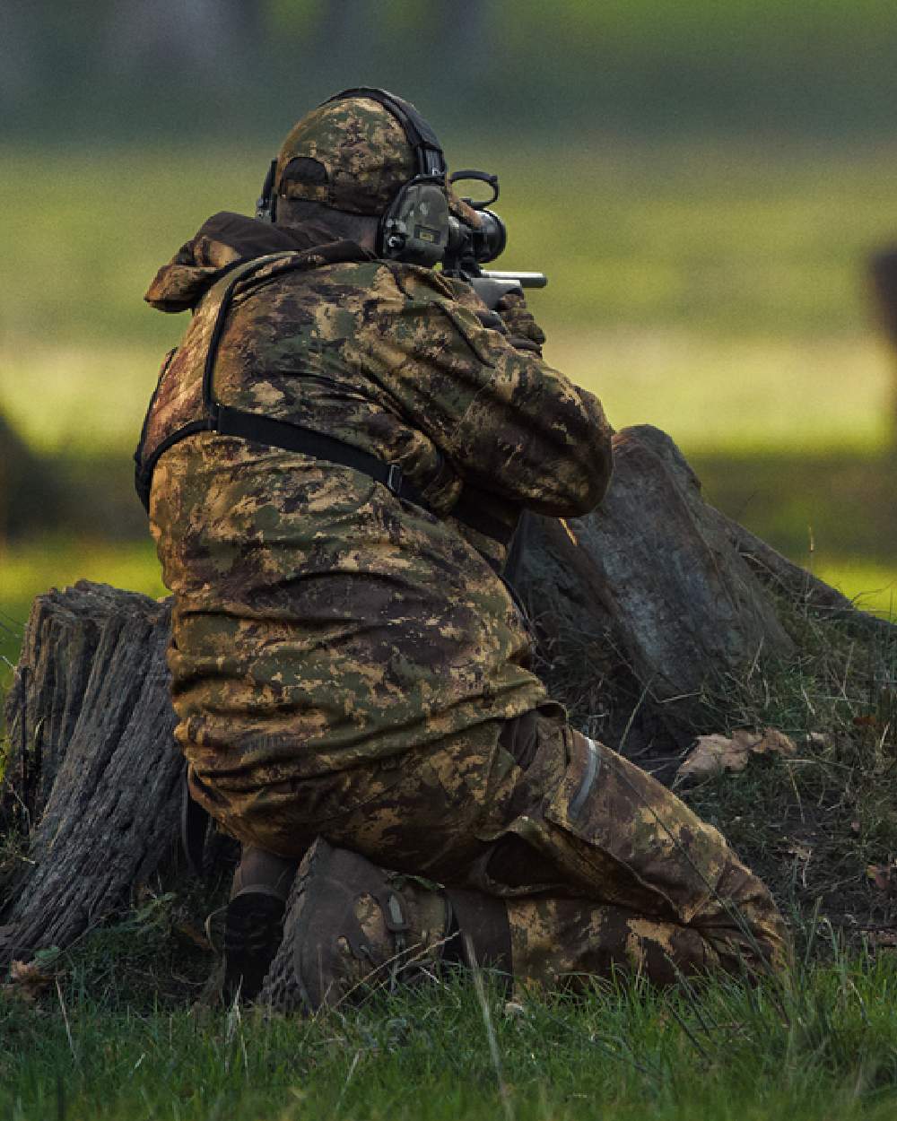 AXIS Forest Coloured Harkila Deer Stalker Camo HWS Jacket on forest background 