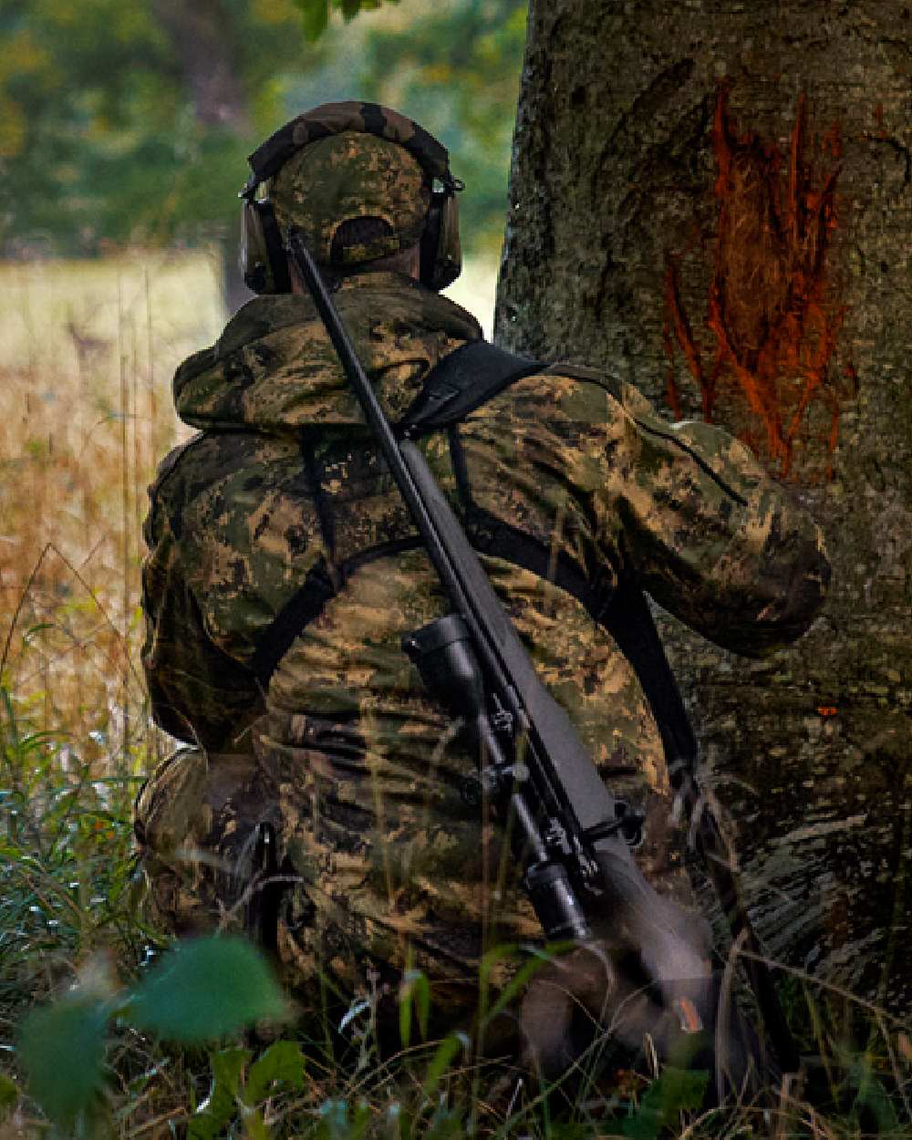 AXIS Forest Coloured Harkila Deer Stalker Camo HWS Jacket on forest background 