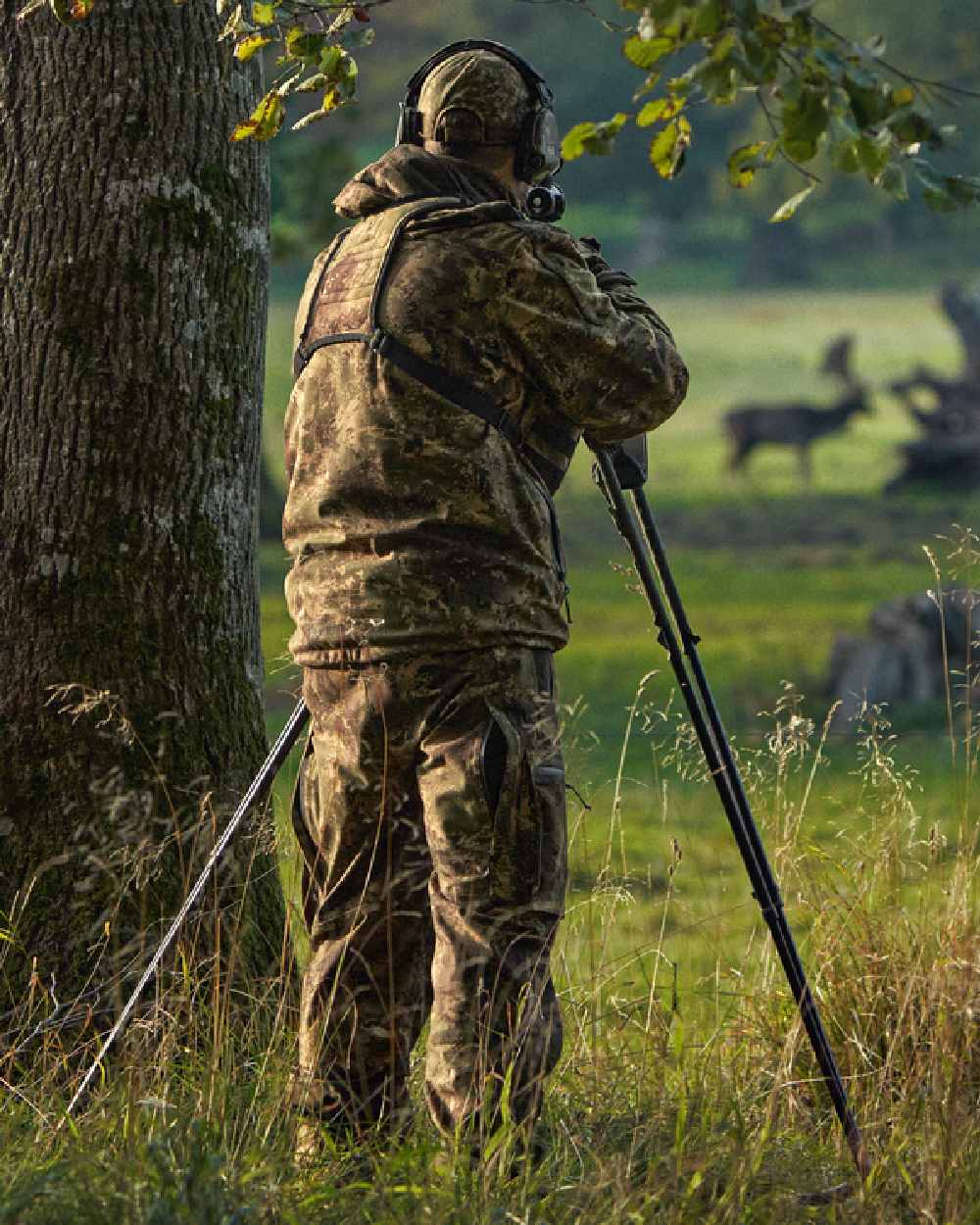 AXIS Forest Coloured Harkila Deer Stalker Camo HWS Jacket on forest background 