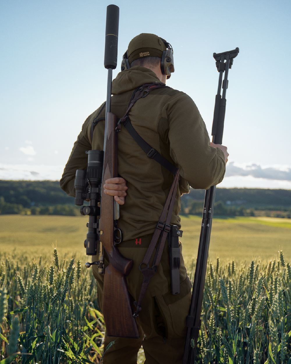 Willow Green Shadow Brown Coloured Harkila Deer Stalker Fleece Hoodie on outdoor background 