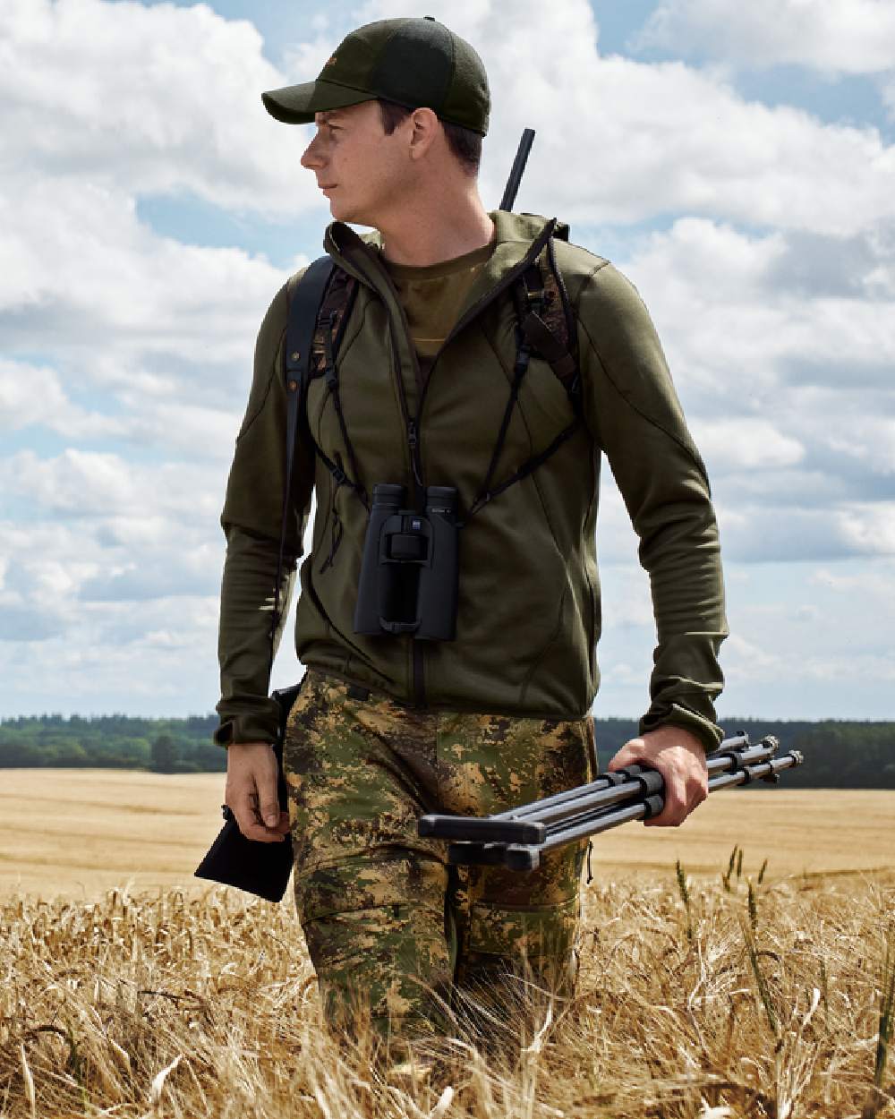 Willow Green Coloured Harkila Deer Stalker Full Zip Fleece Hoodie on farm background 