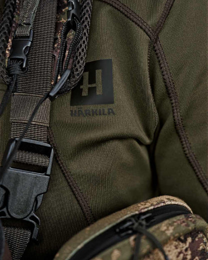 Willow Green Coloured Harkila Deer Stalker Full Zip Fleece Hoodie on blurry background 
