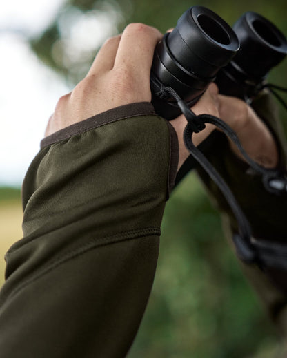 Willow Green Coloured Harkila Deer Stalker Full Zip Fleece Hoodie on blurry background 