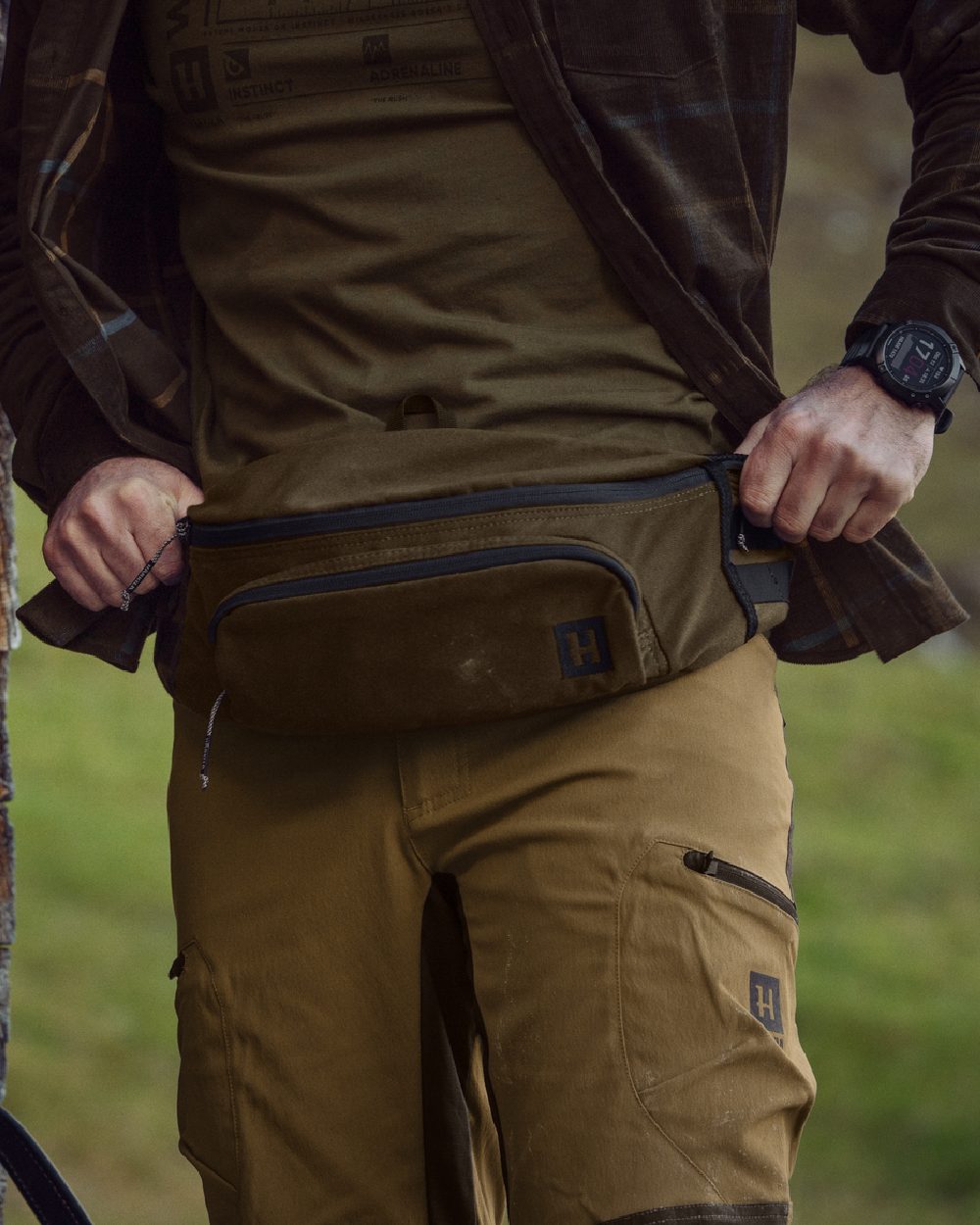 Willow Green Coloured Harkila Deer Stalker Waist Pack on outdoor background 