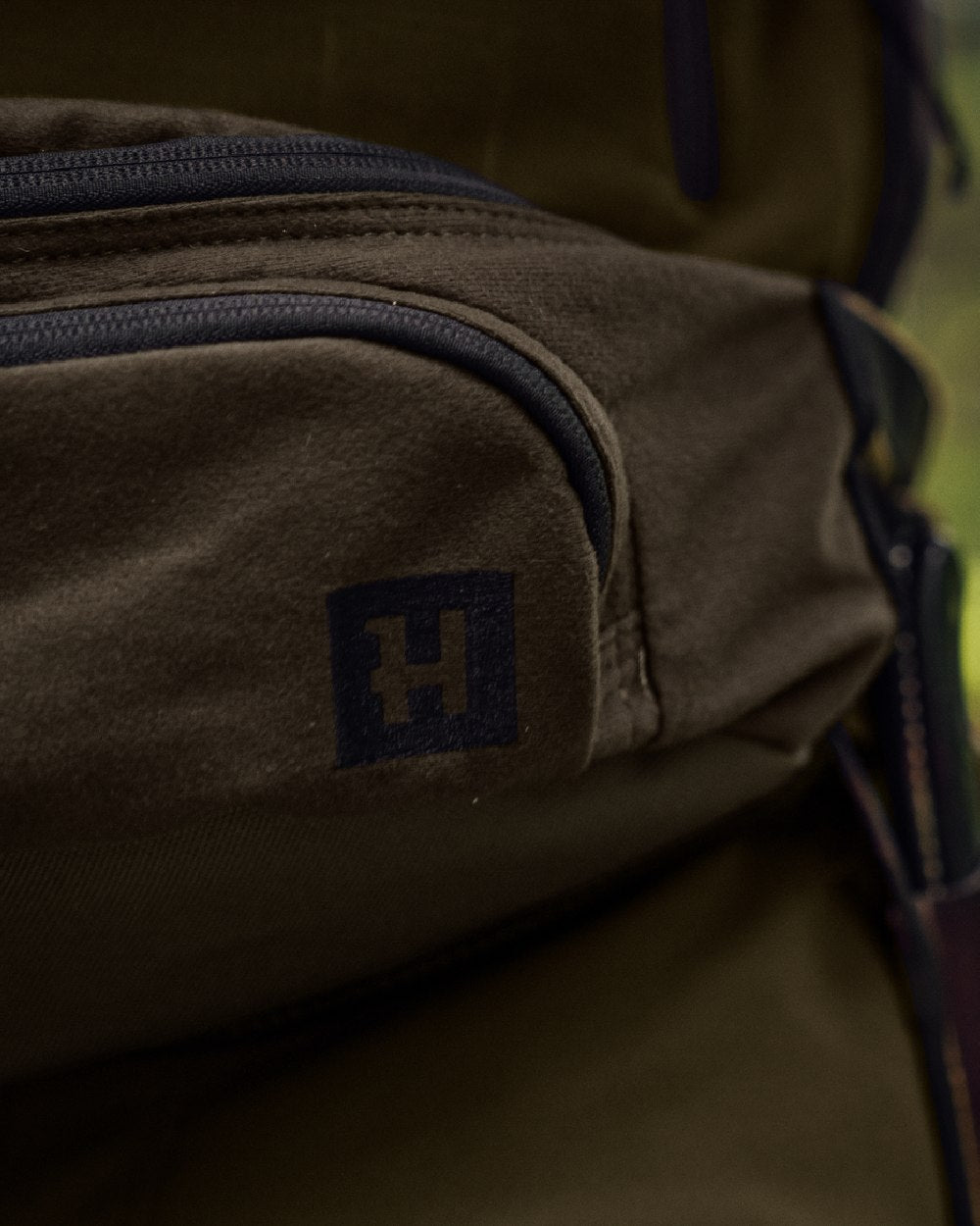 Willow Green Coloured Harkila Deer Stalker Waist Pack on outdoor background 