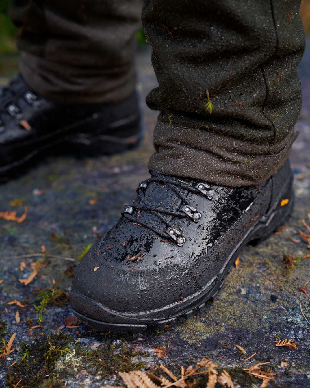 Black Coloured Harkila Driven Hunt 2.0 GTX Boots on outdoor background 
