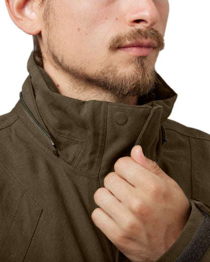 Willow Green Coloured Harkila Driven Hunt HWS Insulated Jacket on white background 