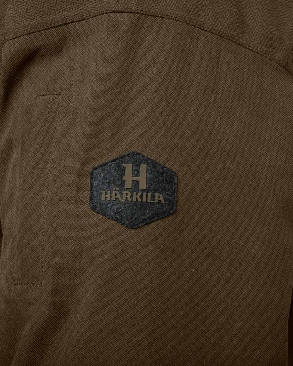 Willow Green Coloured Harkila Driven Hunt HWS Insulated Jacket on white background 