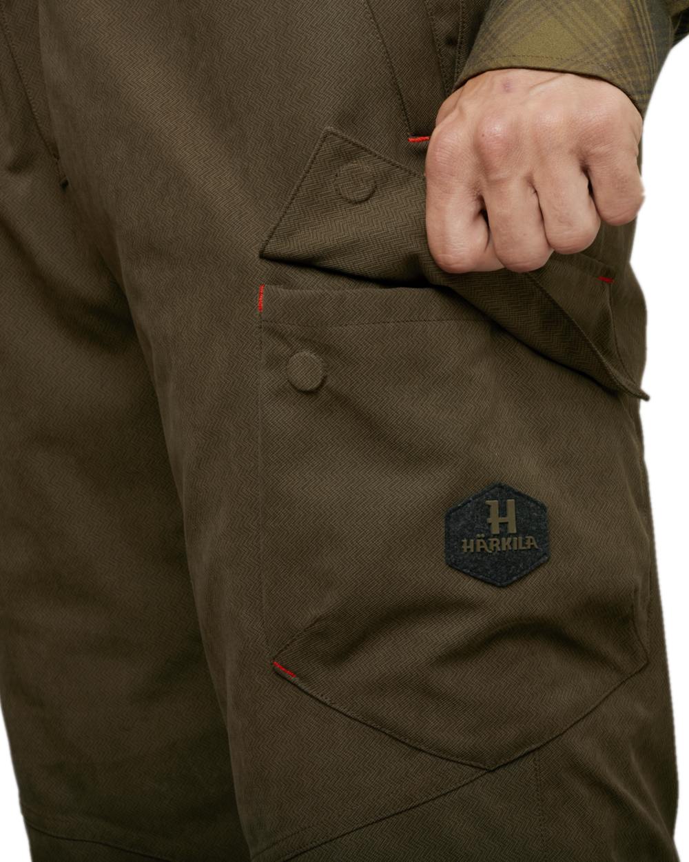 Willow Green Coloured Harkila Driven Hunt HWS Insulated Trousers on white background 