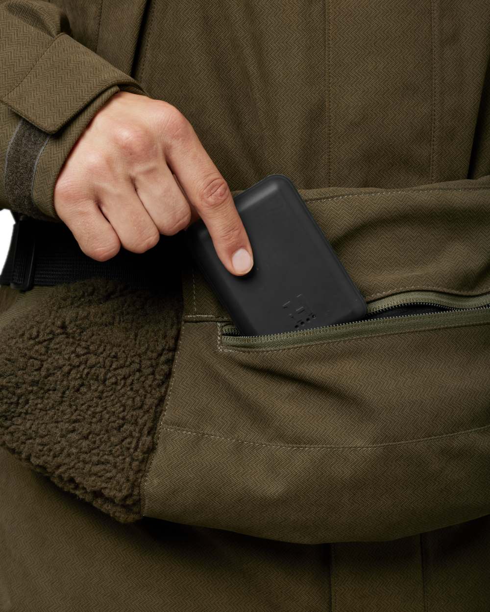 Willow Green Coloured Harkila Driven Hunt Heat Muff on white background 