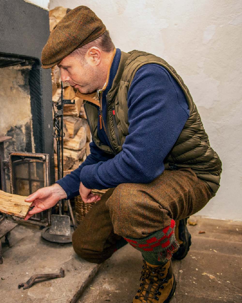 Willow Green Coloured Harkila Driven Hunt Insulated Waistcoat on outdoor background 