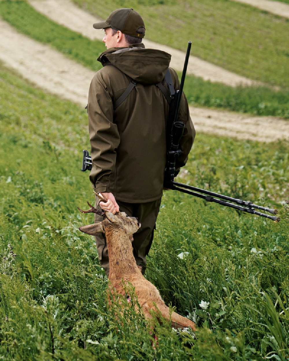 Hunting Green Coloured Harkila Finnmark HWS Jacket on forest background 