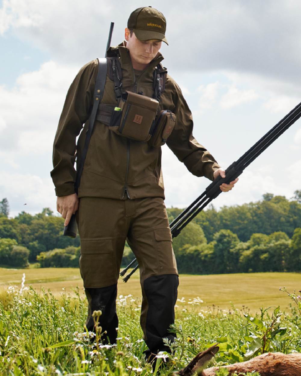 Hunting Green Coloured Harkila Finnmark HWS Trousers on forest background 