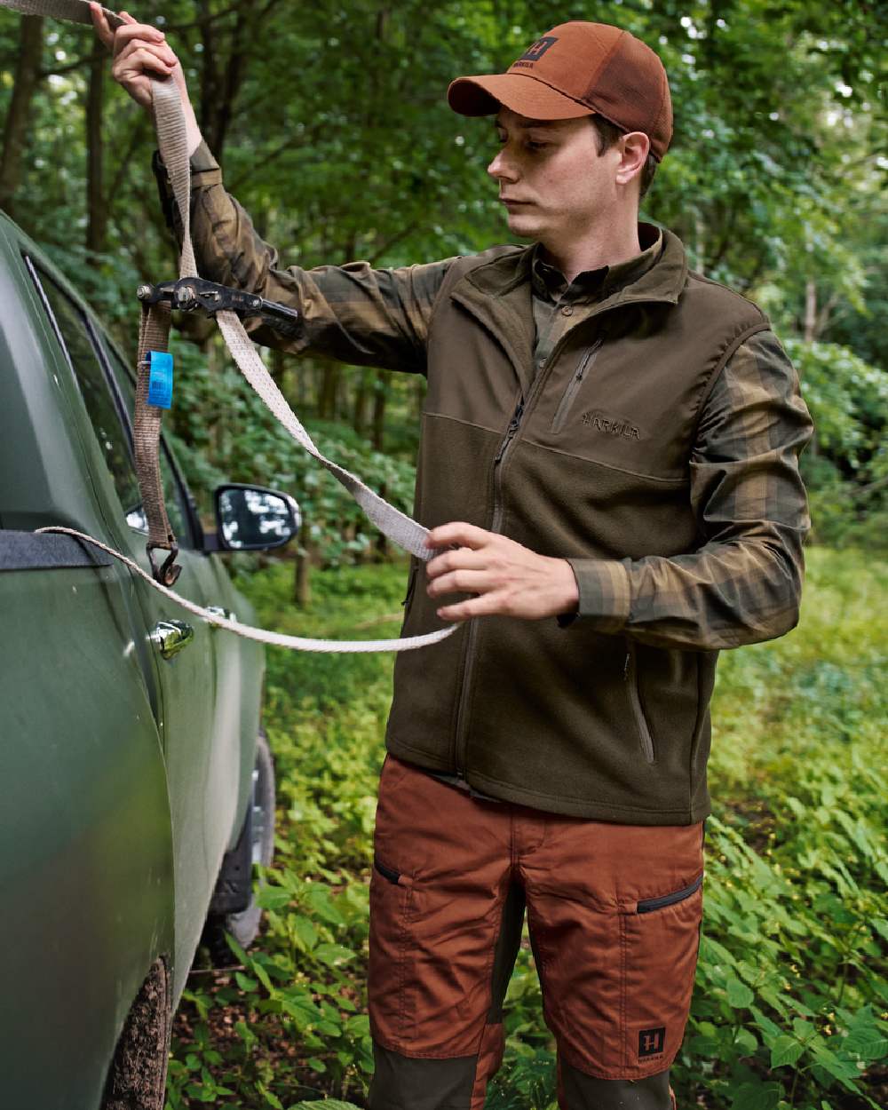 Hunting Green Willow Green Coloured Harkila Fjell Fleece Waistcoat on forest background 