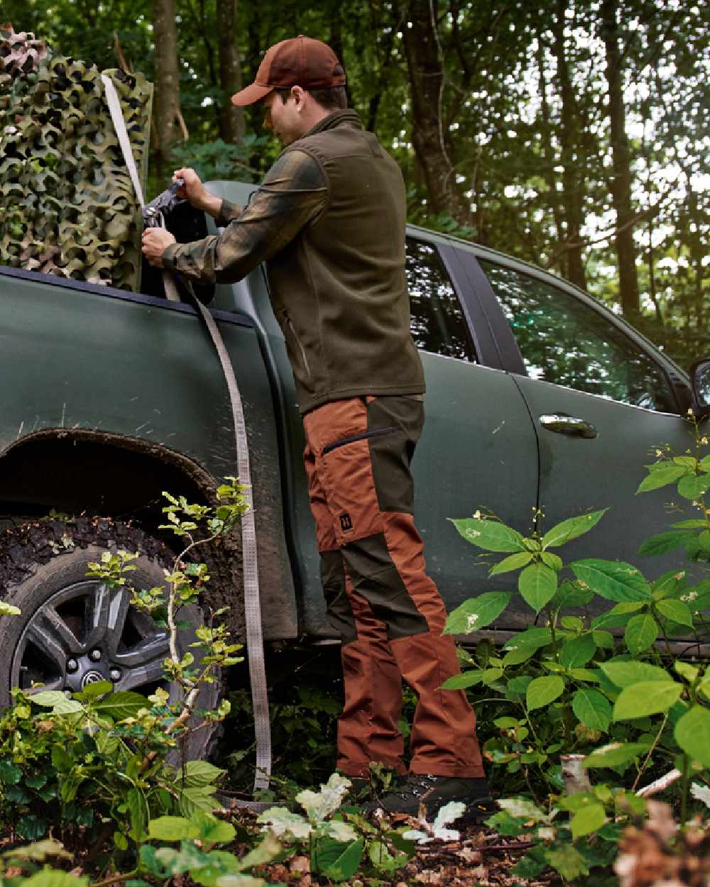 Shadow Brown Arabian Spice Coloured Harkila Fjell Trousers on forest background 