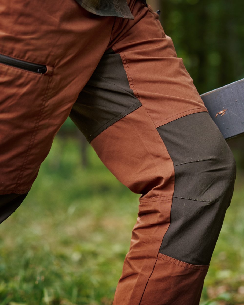 Shadow Brown Arabian Spice Coloured Harkila Fjell Trousers on blurry background 