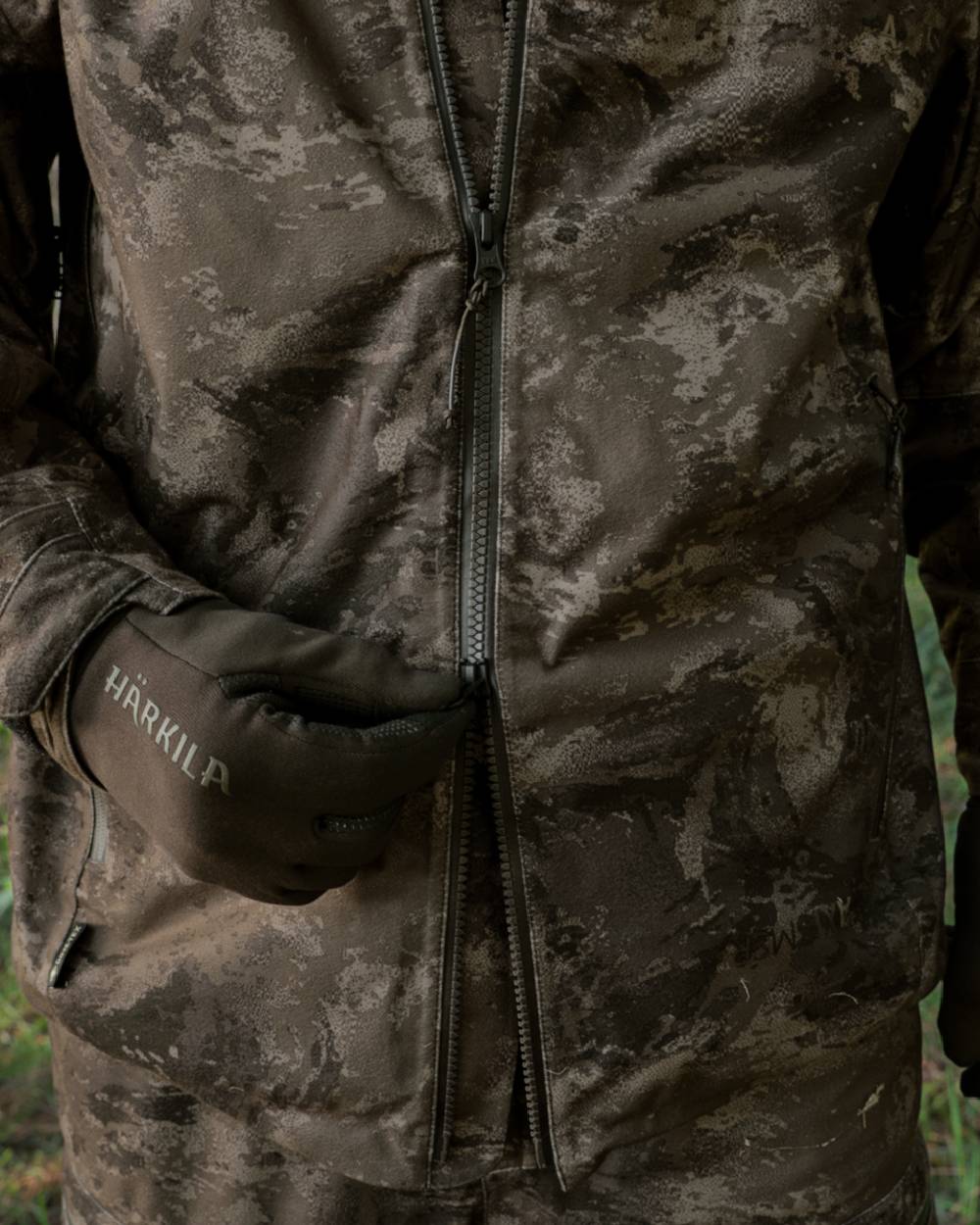 AXIS MSP Darkwood coloured Harkila Forest Hunter GTX Camo Jacket on forest background 