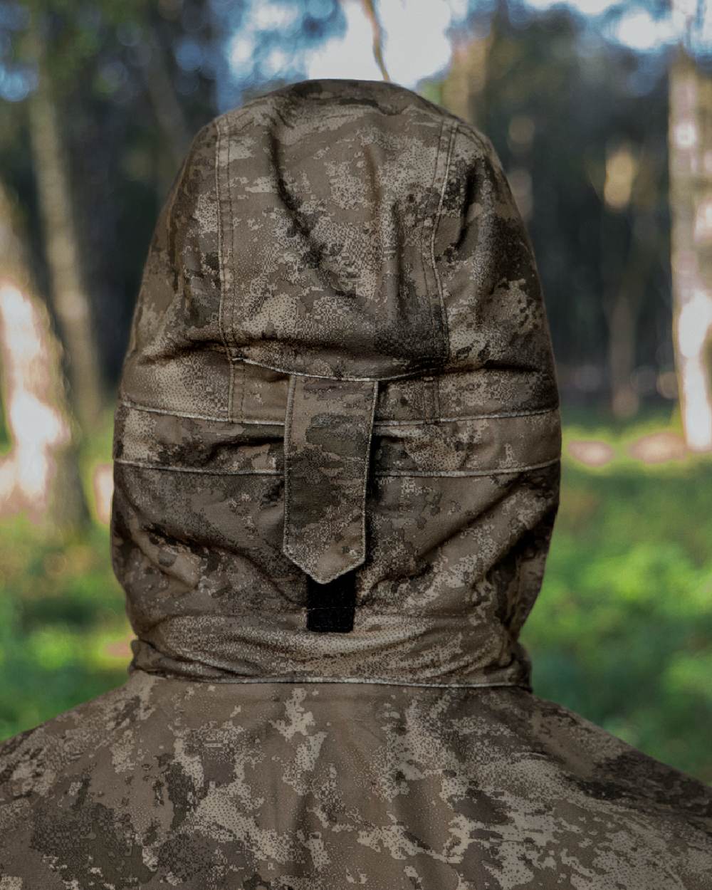 AXIS MSP Darkwood coloured Harkila Forest Hunter GTX Camo Jacket on forest background 