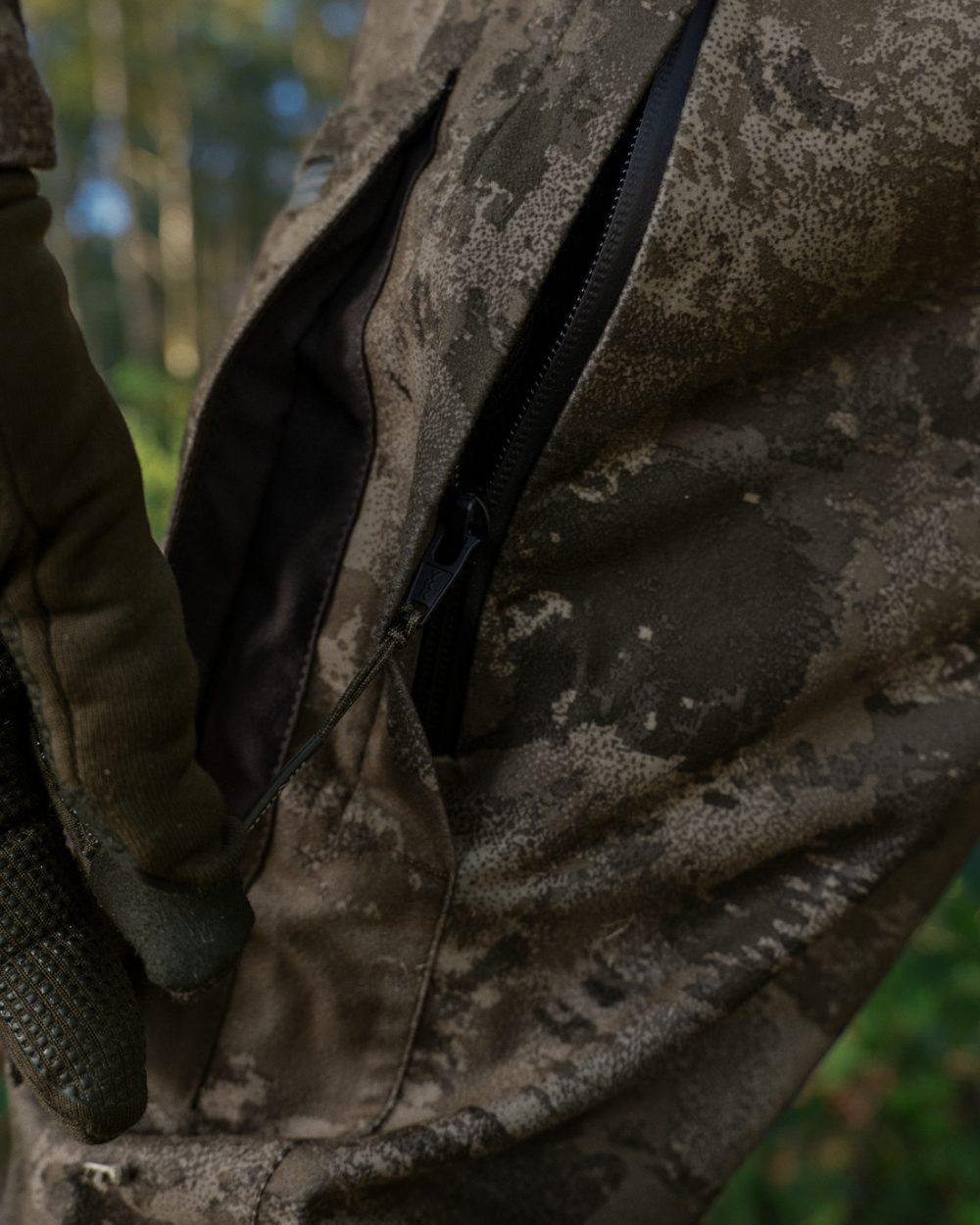 AXIS MSP Darkwood coloured Harkila Forest Hunter GTX Camo Trousers on forest background 