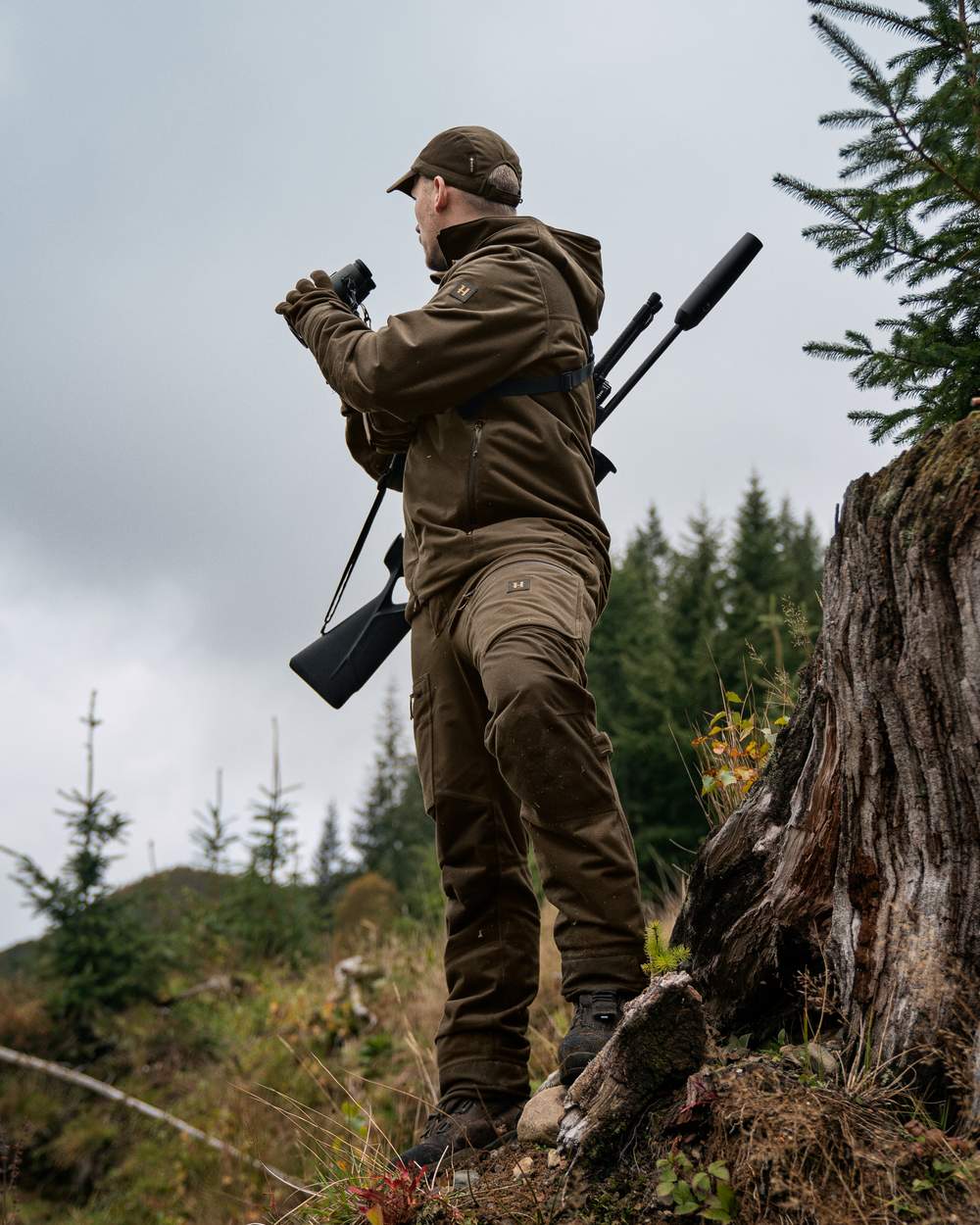 Hunting Green Shadow Brown Coloured Harkila Forest Hunter GTX Jacket on outdoor background 