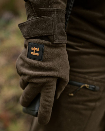 Hunting Green Shadow Brown Coloured Harkila Forest Hunter WSP Gloves on outdoor background 