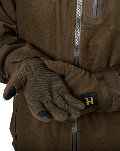 Hunting Green Shadow Brown Coloured Harkila Forest Hunter WSP Gloves on outdoor background 