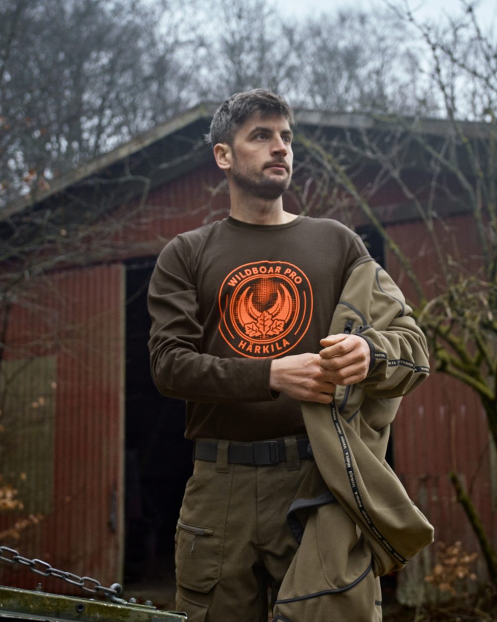 Shadow Brown Wildboar Coloured Harkila Game Long Sleeve T-Shirt on outdoor background 