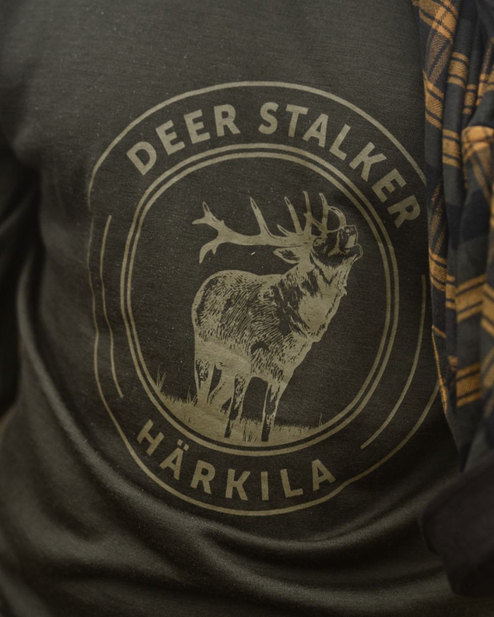 Willow Green Stag Coloured Harkila Game Long Sleeve T-Shirt on outdoor background 
