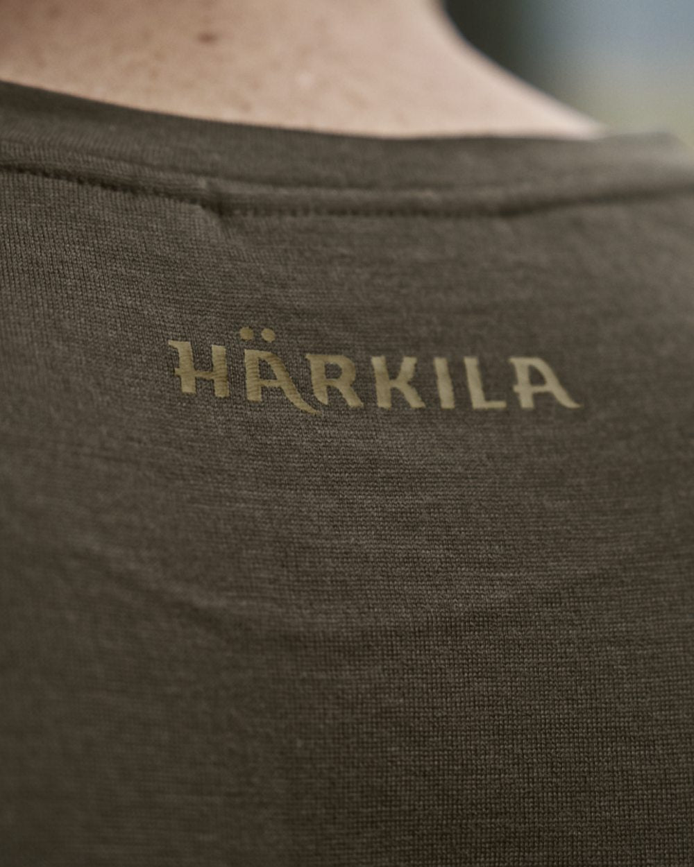 Willow Green Stag Coloured Harkila Game Short Sleeve T-Shirt on outdoor background 