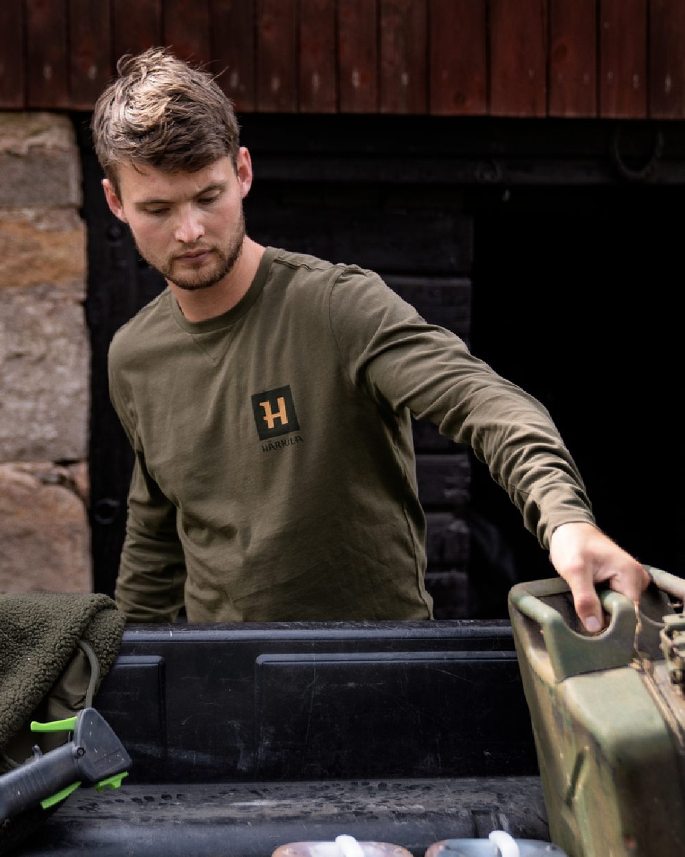 Willow Green Coloured Harkila Gorm Long Sleeve T-Shirt on outdoor background 