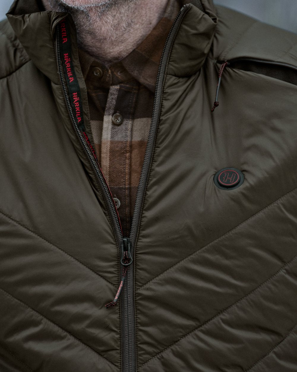 Willow Green Shadow Brown coloured Harkila Heat Insulated Jacket close up 