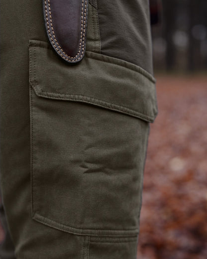 Black Olive Forest Night coloured Harkila Hill Trousers on outdoor background 