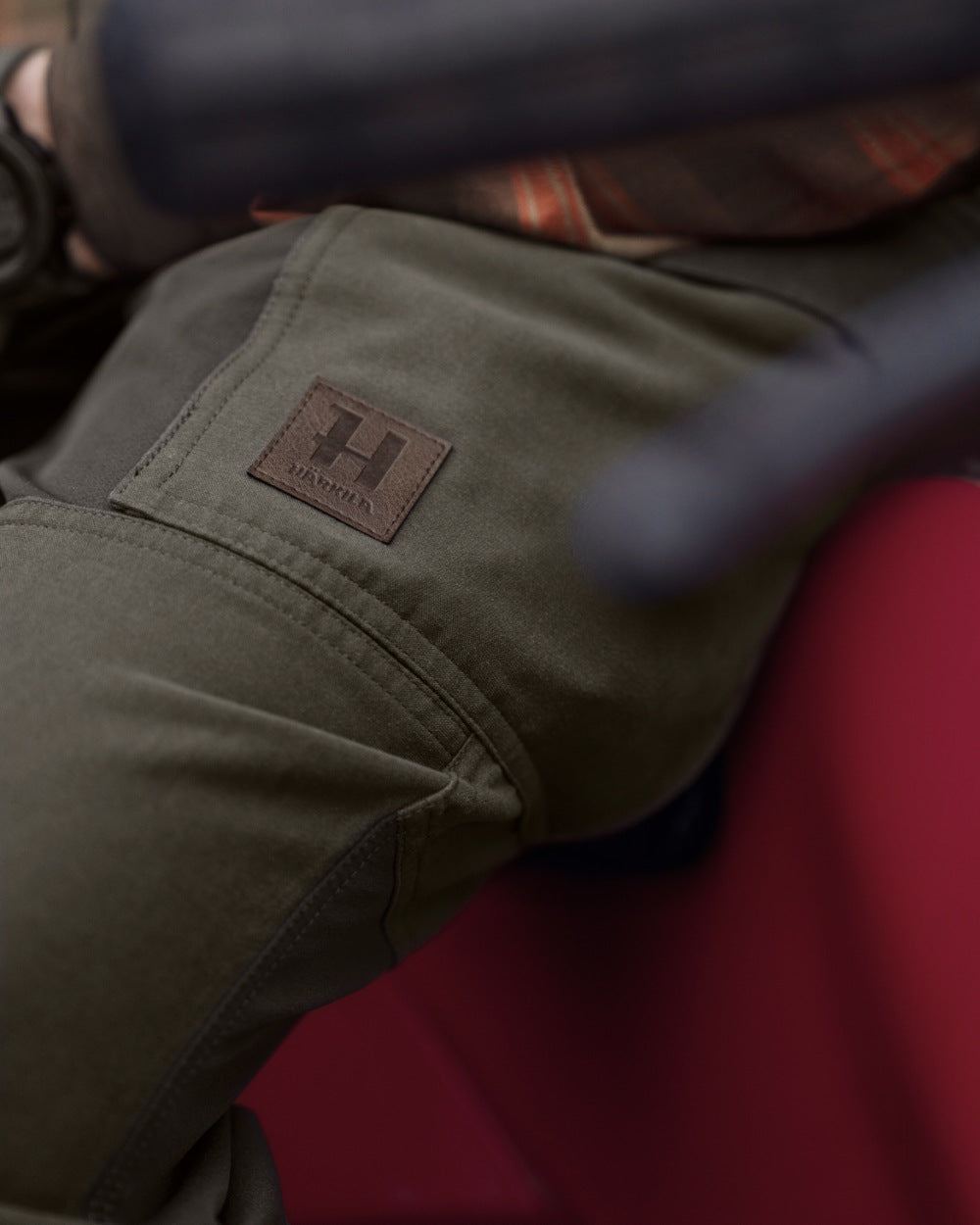 Black Olive Forest Night coloured Harkila Hill Trousers on outdoor background 